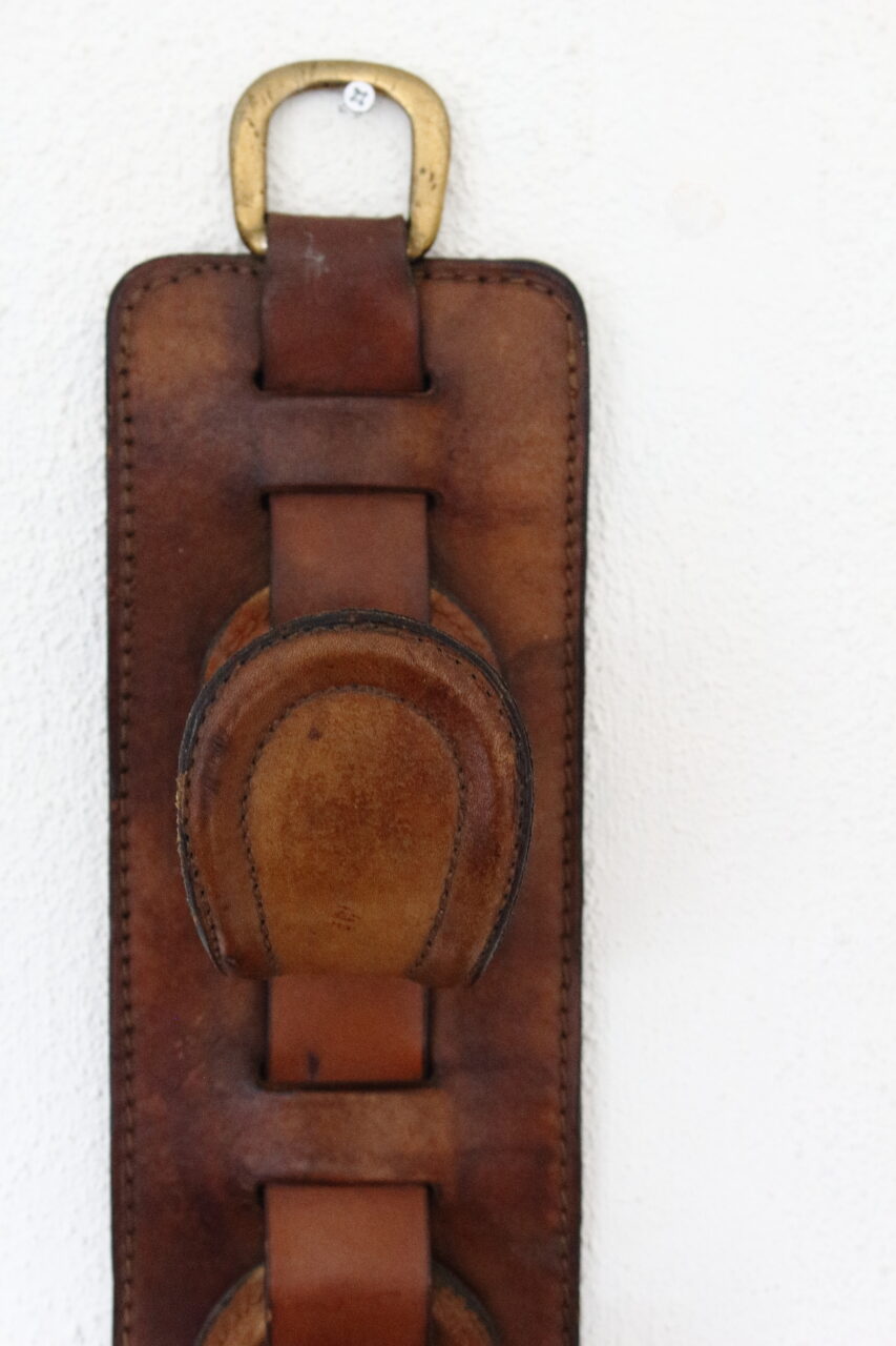 JACQUES ADNET / PAIR OF LEATHER WINE HOLDERS