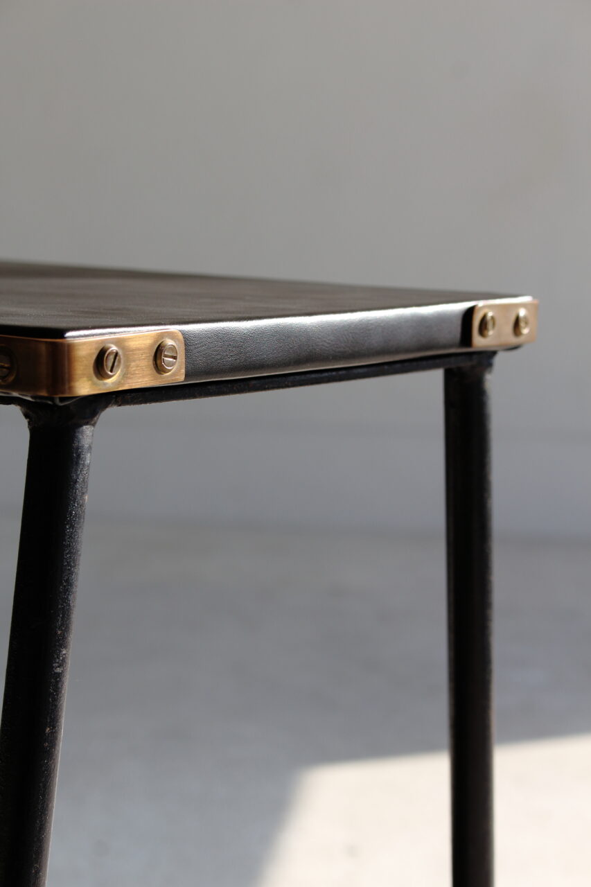 JACQUES ADNET / SIDE TABLE WITH MAGAZINE RACK