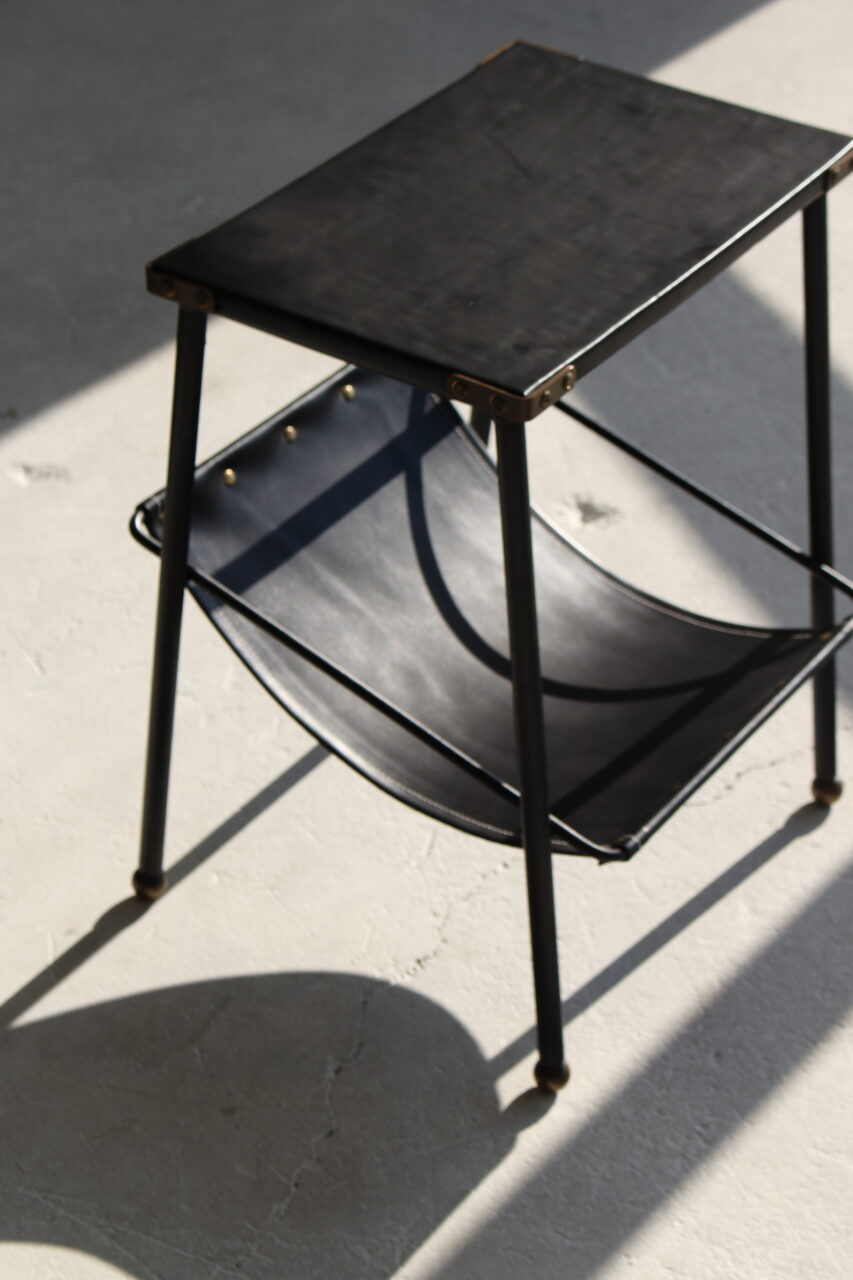 JACQUES ADNET / SIDE TABLE WITH MAGAZINE RACK